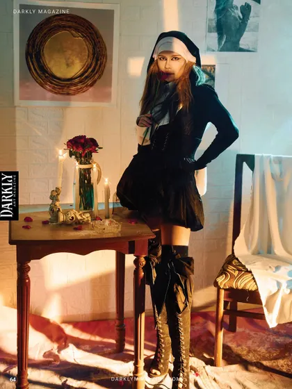 A full scene from the Darkly Magazine gothic editorial, showing the set design and props.