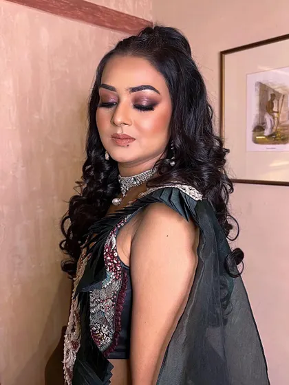 A close-up of the smokey brown eyes for the bohemian sangeet look. The dramatic effect is perfect for a night of dancing and celebration.