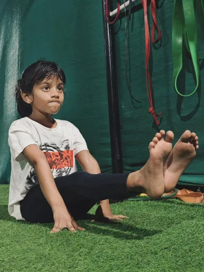 This young girl shows incredible grit as she holds her L-sit. We teach our kids to be mentally and physically tough.