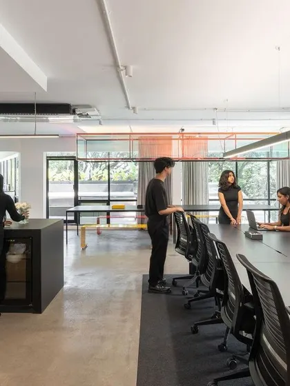 The main collaborative zone in Studio 2.0, where a long table encourages teamwork. The open layout and minimalist design are a physical representation of our own work culture, which values transparency and shared ideas.