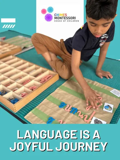Language is a joyful journey. This child is using the movable alphabet to build words, connecting sounds to symbols in a fun, interactive way.