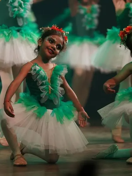 The mystical flora dancers in a graceful pose. Their movements are designed to be ethereal and enchanting, like a magical forest come to life.