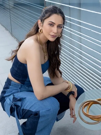 Rakul Preet showing how to style a full denim look with a chunky Upakarna bangle stack and hoops. Effortless, cool, and so on-trend.