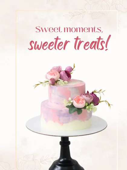 A beautiful two-tiered cake with a dreamy pink and purple watercolor finish. Adorned with delicate sugar flowers, this design is perfect for creating sweet moments at birthdays, anniversaries, or elegant gatherings.