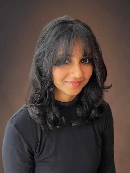 Pravallika looking lovely with her new layered cut.