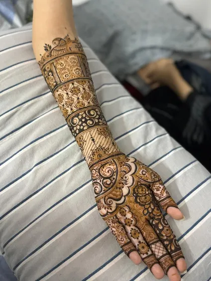 This is a detailed view of my intricate bridal henna work. Each design is unique, combining traditional patterns like paisleys and mandalas with fine-line fillers to create a stunning, full-coverage look for your special day.