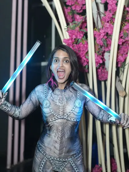 Getting into the Halloween spirit with a cyberpunk costume and LED batons. Themed parties are the best excuse to get creative with costumes and props.