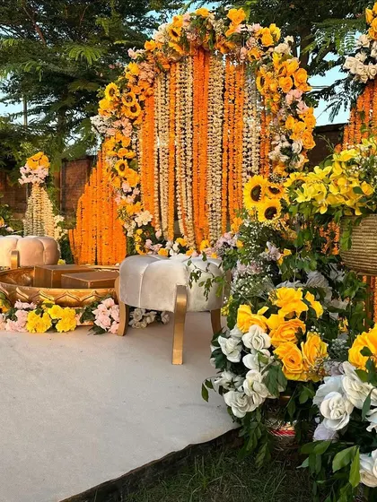 We love bringing vibrant traditions to life, like this joyful Haldi ceremony. The decor is rich with marigolds and sunflowers, creating a sun-kissed, energetic setting complete with traditional brass urlis for the rituals.