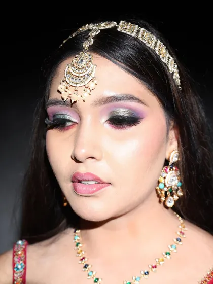 A close-up of the multi-colored smokey eye. I used shades of purple and black to create this intense and modern look.