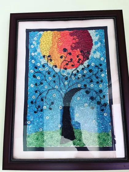 This is where it all started for me, with paper quilling. This framed tree of life is one of my early pieces, made by rolling and shaping tiny strips of paper.