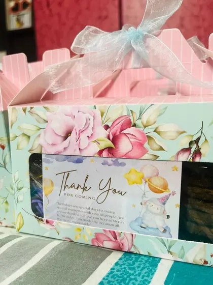A close-up of the custom "Thank You" sticker I designed for these baby shower favors. Personalizing the message makes the gesture more meaningful for your guests.
