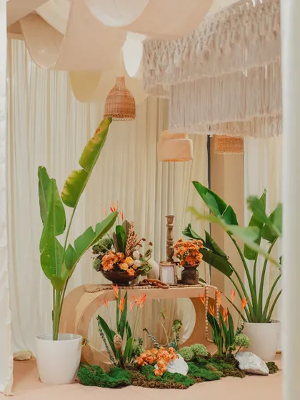 Who said carnivals have to be loud? For this event, we used soft lights, cream tones, and lush greens to create a relaxed and unconventional carnival atmosphere.