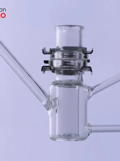 A perfectly lit shot of a glass piece, capturing its shape and transparency without distracting glares.