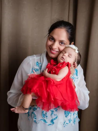 A mother's love is a reflection of strength and sparkle. We love capturing these tender moments between mom and baby.