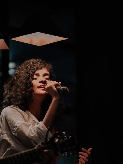 A moody shot from a duo performance at Nosh Haus in Kochi. Performing with another musician adds a whole new layer to the music, perfect for creating a soulful atmosphere.