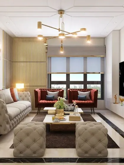 A formal sitting area with tufted sofas and gold accents, showcasing a blend of classic and modern design elements.