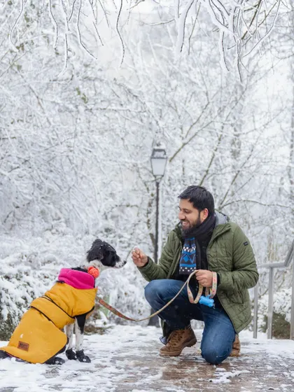Another shot from our snowy adventure. Fuji is looking so smart and warm in her little winter jacket and boots.