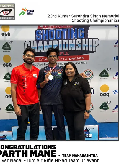 Parth Mane with his coach after winning a silver medal in the 10m Air Rifle Mixed Team Jr event at the KSS Shooting Championships.