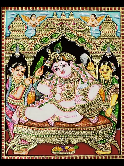 A close-up, unframed view of the Butter Krishna Tanjore painting. You can see the fine details of the gold foil, the expressions of the gopis, and the overall richness of the composition.