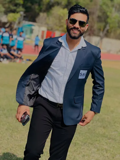 A candid moment at a sporting event. My life revolves around kabaddi and mentoring the next generation of players.
