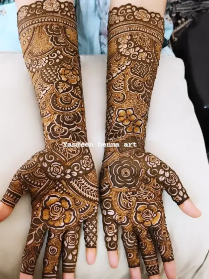 Another look at this floral bridal piece, showing the symmetry and flow of the design across both arms.