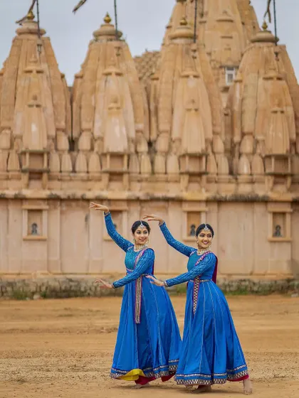 A static pose that still conveys a sense of movement and grace. The essence of Kathak is in its balance of stillness and speed.