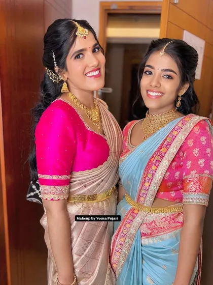 Sister goals. It was so much fun getting these two sisters ready for a family wedding. Their coordinated looks are bright, happy, and full of smiles.