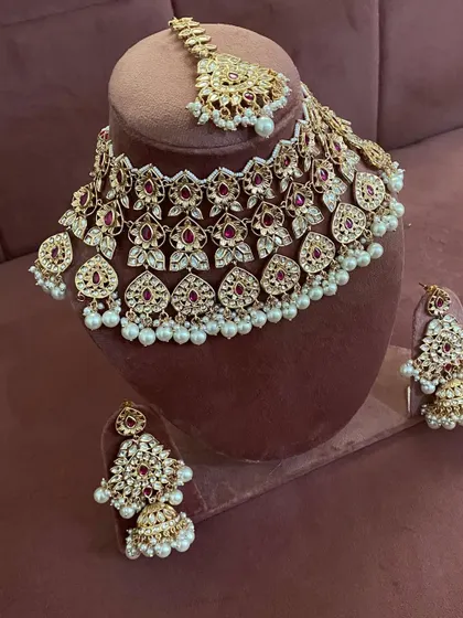 Another angle of the modern ruby choker set, showing how the pieces coordinate. This rental set is perfect for a contemporary bride.