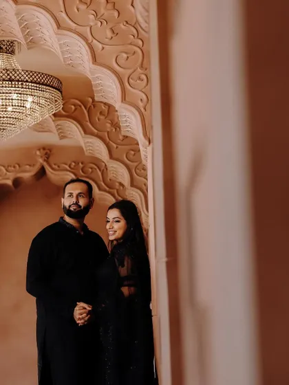 Another beautiful photo from the same pre-wedding shoot, with the grand chandelier adding to the romance.