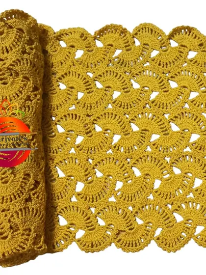 The lacy stole in a warm mustard yellow. This color is perfect for adding a pop of brightness to your outfit.