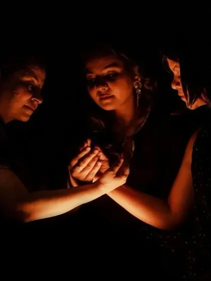 An intimate and powerful image from the 'Quest' photoshoot. This moment represents the support and shared strength among the characters in their journey of resilience.