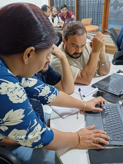 Collaborative Learning in a Corporate Setting. Participants working together during our Advanced Excel training. My workshops encourage peer-to-peer learning, as colleagues help each other understand and apply new technical skills.