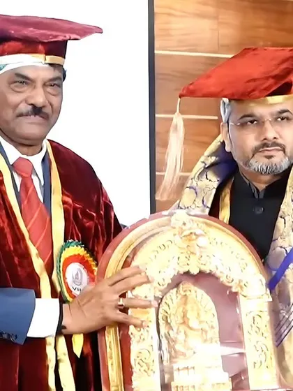 Being honored by the college chairman with a shawl and a memento. I accept such honors on behalf of my entire team and the people of Hangal.