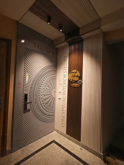 This entrance sets a modern, minimalist tone for the entire 3BHK. The intricately designed main door is a work of art in itself.