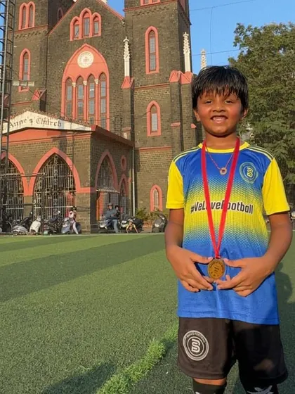 This young player earned his Player of the Month medal through hard work and a great attitude.