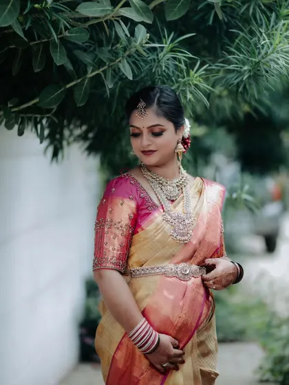 Finding the perfect balance is key. Here, the layered necklace, choker, and vaddanam come together to create a complete and cohesive look for my client's family wedding.