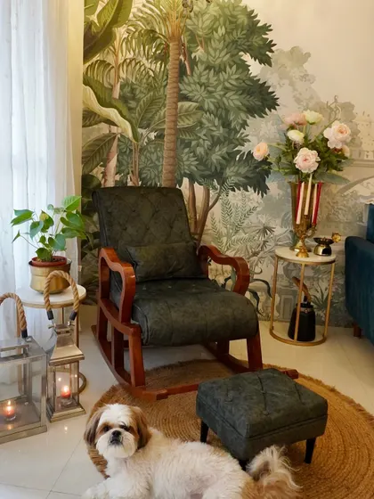 For a more traditional feel, I styled this corner with a wooden rocking chair and a footstool. My dog, Tofu, seems to approve of this cozy setup.