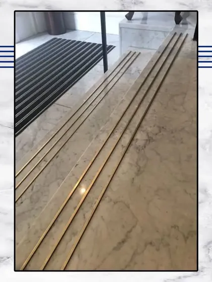 A close-up of the high-quality materials we use. These brass-inlaid marble steps are a small but significant detail that adds a touch of custom luxury.