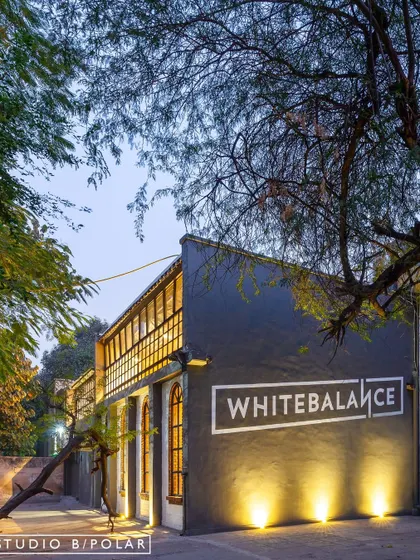 The exterior of the WhiteBalance Office, our first project and a landmark in adaptive reuse. We transformed a dormant warehouse in an industrial area into a bold and bright creative studio, showcasing the potential hidden in such structures.