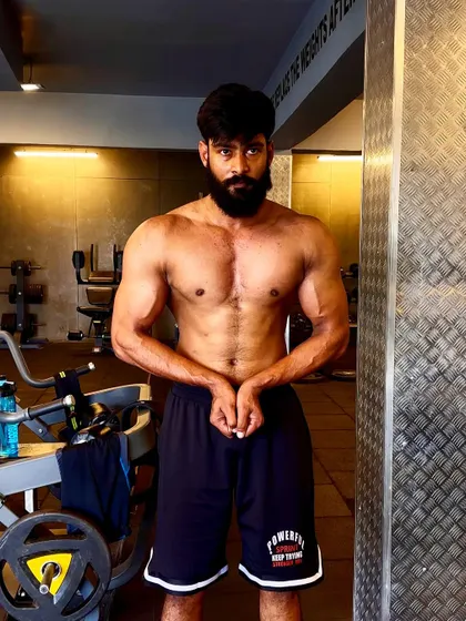 "Alpha mode activated." A confident physique pose, showing the results of consistent training.