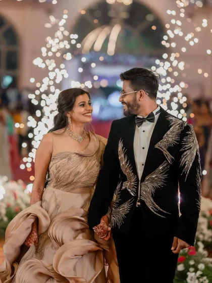 Making an entrance that lights up the night. Sumana and Anvay's reception was nothing short of a movie scene, and we were there to capture every spark of their grand celebration.