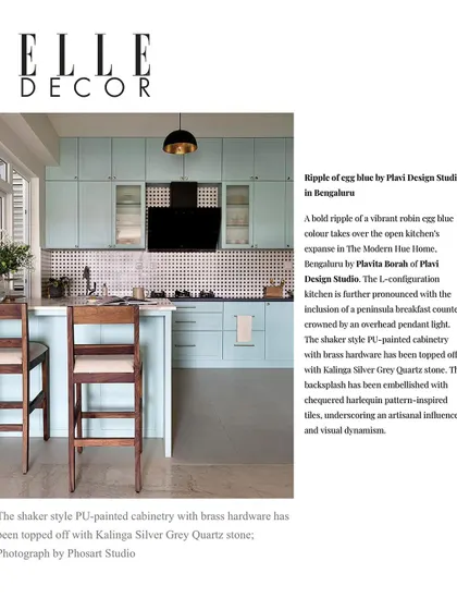 Our light blue kitchen featured in an Elle Decor article on colorful kitchens. This highlights the shaker-style cabinetry and brass hardware.