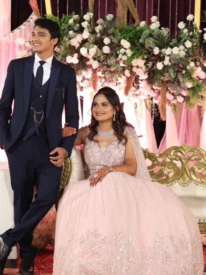 The complete picture. A beautiful couple ready for their reception, with the bride wearing a soft glam look that enhances her natural beauty.