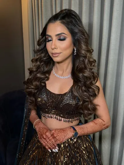 The volume and definition in these curls are designed to last through a night of dancing and celebration.