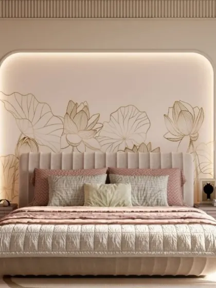 A delicate, nature-inspired mural within a backlit arched niche creates a soft and romantic focal point. The pink and green color palette and vertically striped headboard add to the room's gentle and calming feel.