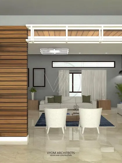 A view from one living space to another, framed by a wood-clad column and a white metal shelving unit. This shows how I create distinct zones within an open-plan layout.