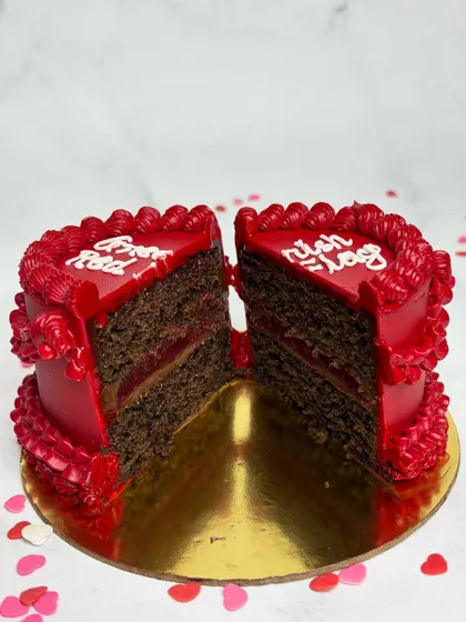 Here's the cross-section of our "Greenish Red Flag" cake. This one is the 3-berry Belgian chocolate flavor, with rich, moist chocolate cake and a tangy berry filling.