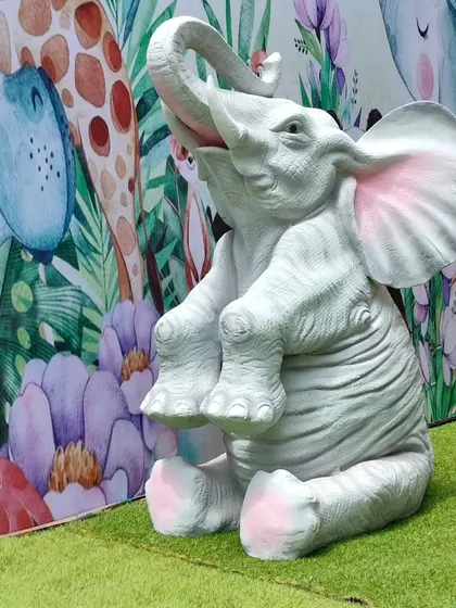 A close-up of a charming elephant prop used in one of our jungle themed parties. These detailed props add a realistic and immersive touch to the overall decor.