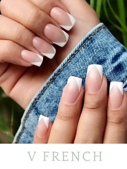 For a sharper, more modern look, I create a V-French manicure. The angled white tips give the nails a bold, geometric appearance that elongates the fingers.