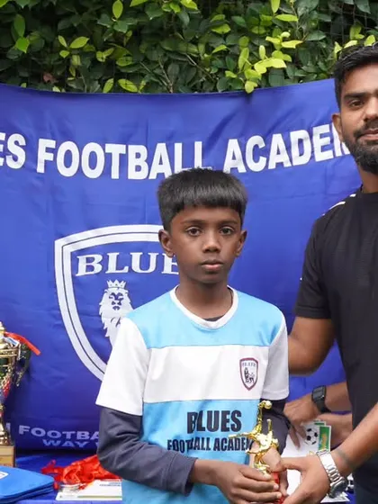 Another one of our promising young players receiving his award. I make it a point to personally congratulate and encourage each winner.